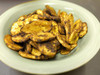 Plantain chips dusted with sweetened dark cocoa and peanut butter