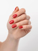 WOMEN FASHION HANDS POSING CRACKLED RED NAILS WITH DIAMOND