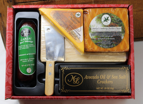 ML7011 Mille Lacs Classic Collection Gift 
* Northwoods Cheese Smoked Cranberry Cheddar Square|  6.0 oz
* Northwoods Cheese Wisconsin Cheddar Cheese Triangle |  4.0 oz
* Mille Lacs Olive Oil & Sea Salt Crackers  |  0.55 oz
* Mille Lacs Garlic Beef Sausage  |  5.0
* Rectangle Wood Cutting Board  |  7" x 4.5 " 
* Stainless Steel Cleaver