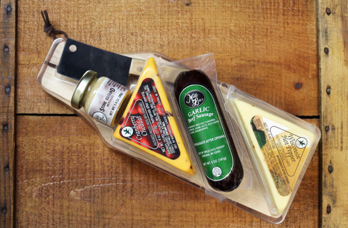 ML7063 Mille Lacs Wooden Paddle Board Gift
Gift Includes:
* Wisconsin Hot Pepper Cheese Wedge  |  4.0oz
* Wisconsin Cranberry Cheddar Cheese Wedge  |  4.0oz
* Mille Lacs Sweet N Hot Mustard   |  1.4oz
* Mille Lacs Garlic Beef Summer Sausage  |  5.0oz
* Wood Paddle Board  |  4.25" x 11.5"
* Stainless Steel Meat Cleaver
