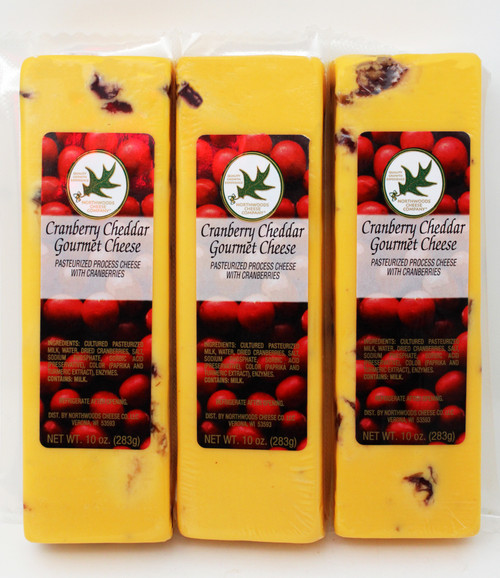 1056A 10oz Bars Northwoods Cheese 3 for $15 Cranberry Cheddar Cheese Special.  Medium Cheddar Cheese flavor combined with Sweet and Dried Cranberries from Wisconsin and made in Wisconsin.  Our best selling Cheese flavor.  