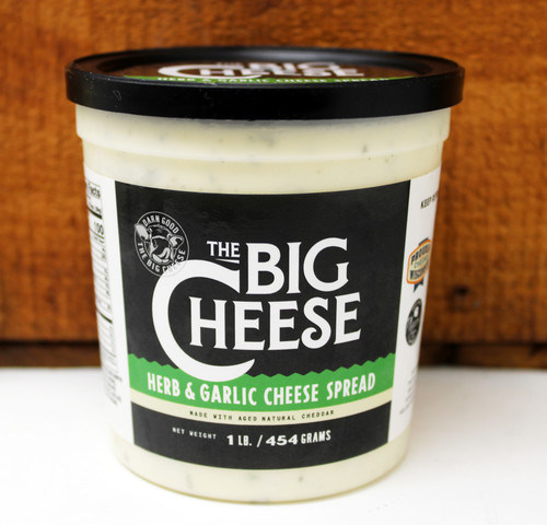 TBC 1# Herb and Garlic Aged Cheddar Spread, Made in Wisconsin with white aged cheddar cheese.