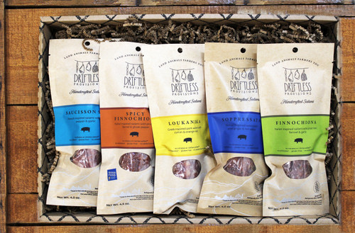 Driftless Provisions Salami Gift, featuring one each of: 4.5oz Saucisson Sec Salami, 4.5oz Finnochiona Salami, Soppressata 4.5oz, 4.5oz Spicy Finnochiona Salami, and 4.5oz Loukanika Salami.  Made exclusively from Berkshire hogs raised without antibiotics, hormones, or animal byproduct.  Assembled in Wisconsin by workers with disabilities.