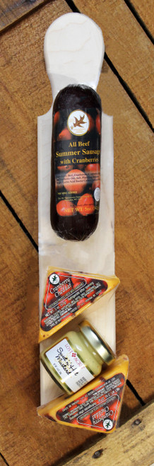 Gift 157 Northwoods Cheese Company Paddle of Treats is assembled by Persons with Disabilities, and is made with wooden paddle boards made in the United States.  The gift comes loaded up with 5oz. All Beef Cranberry Summer Sausage, 4oz. of Wisconsin Cranberry Cheddar Cheese, and 1.4oz. Mustard. Makes an easy gift! Made with Wisconsin Cheese, sausage and hardwood cutting board from Wisconsin.