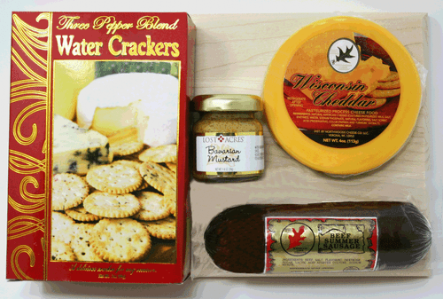 Gift 102R Wisconsin Delights With Cheddar Cheese Gift Our American Hardwood cutting board measuring 6.5"x10" is the base for this popular gift. 4oz of Wisconsin Cheddar cheese, 5oz of Northwoods Cheese All-Beef Summer Sausage, 1.4oz of Mustard and a 2oz Box of Three Pepper Water Crackers. Gift 102R Wisconsin Delights With Cheddar Cheese Gift Our American Hardwood cutting board measuring 6.5"x10" is the base for this popular gift. 4oz of Wisconsin Cheddar cheese, 5oz of Northwoods Cheese All-Beef Summer Sausage, 1.4oz of Mustard and a 2oz Box of Three Pepper Water Crackers.