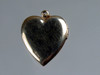 Marked gold filled on back of heart locket