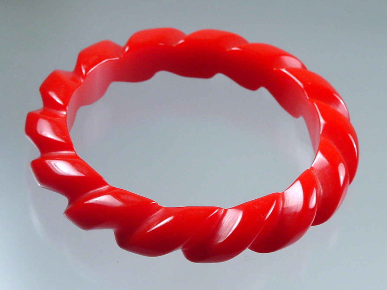 Carved Red Rope Bakelite Bangle