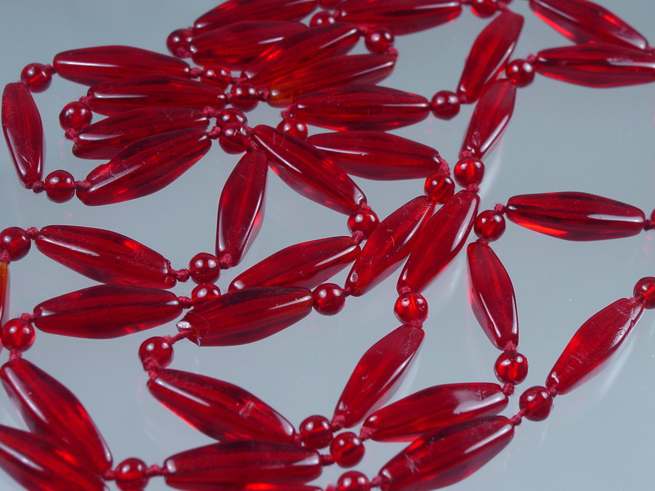 Close up of Red Czech Glass Beads in Necklace