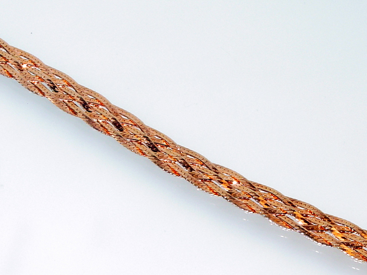 Close up Herringbone Chains Braided Together