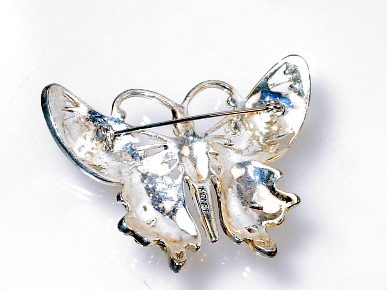 Signed Monet on Bright Silver-tone Back Signed Monet on Bright Silver-tone Back