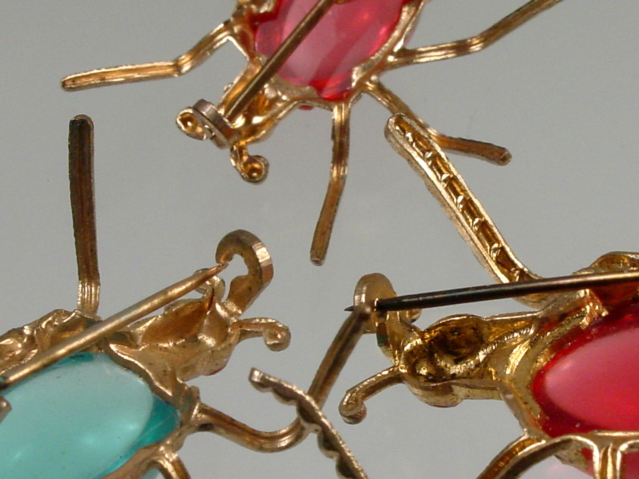 Open C Clasps on each Pin