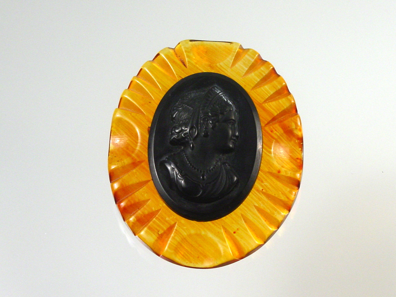 Late 1940's Overdyed Apple Juice / Amber Lucite Cameo