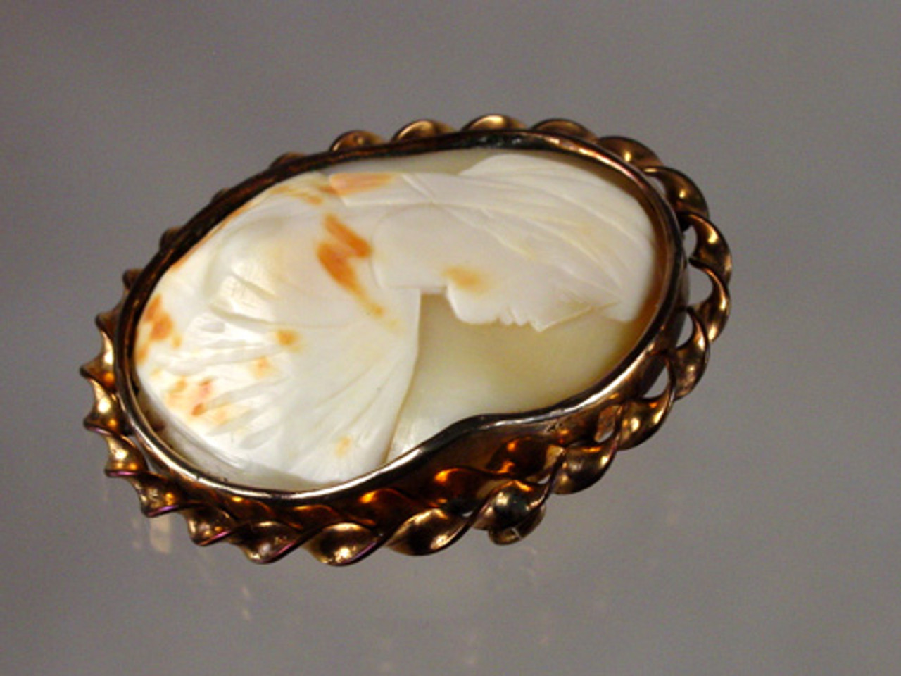 Antique carved shell cameo brooch