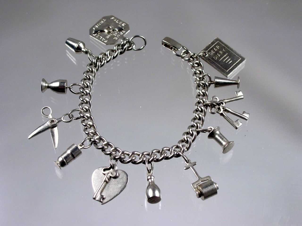 Monet Silver Charm Bracelet – Estate Beads & Jewelry