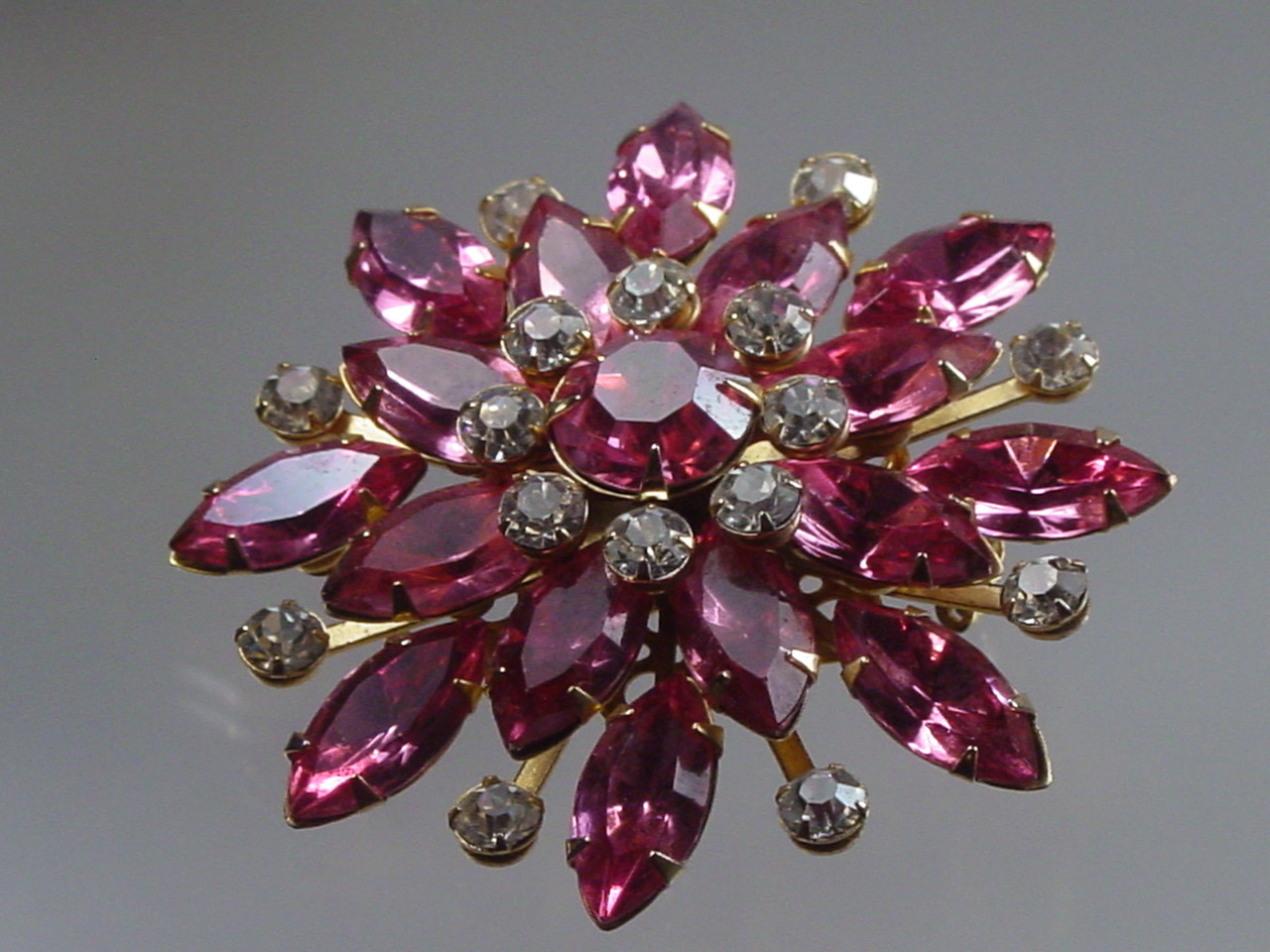 1960's Pink Rhinestone Brooch in Golden Setting