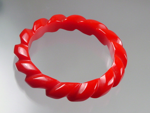 1940's Heavily Carved Red Bakelite Bangle 1940's Heavily Carved Red Bakelite Bangle