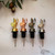 Display showing all 4 colors of our new stainless steal straw gravity pour spouts