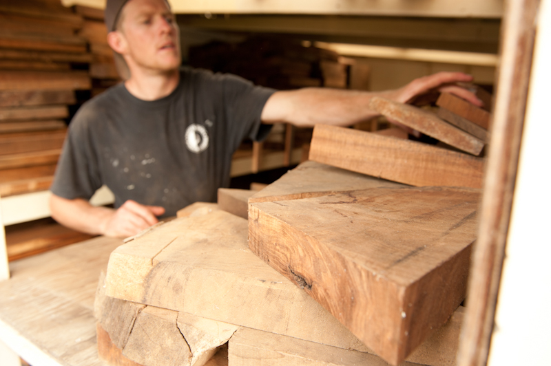 Winter selecting wood from one of our koa stacks