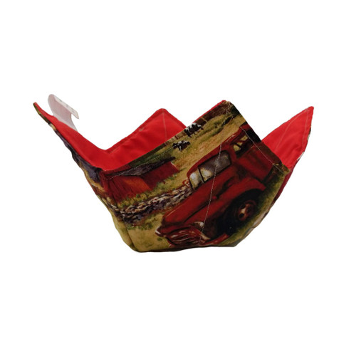 Microwave Bowl pot holder with old farm and red truck design. Red fabric inside.