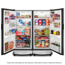 Open doors of Gladiator Garage-Ready Refrigerator and Freezer Set showing organized groceries in a garage setting