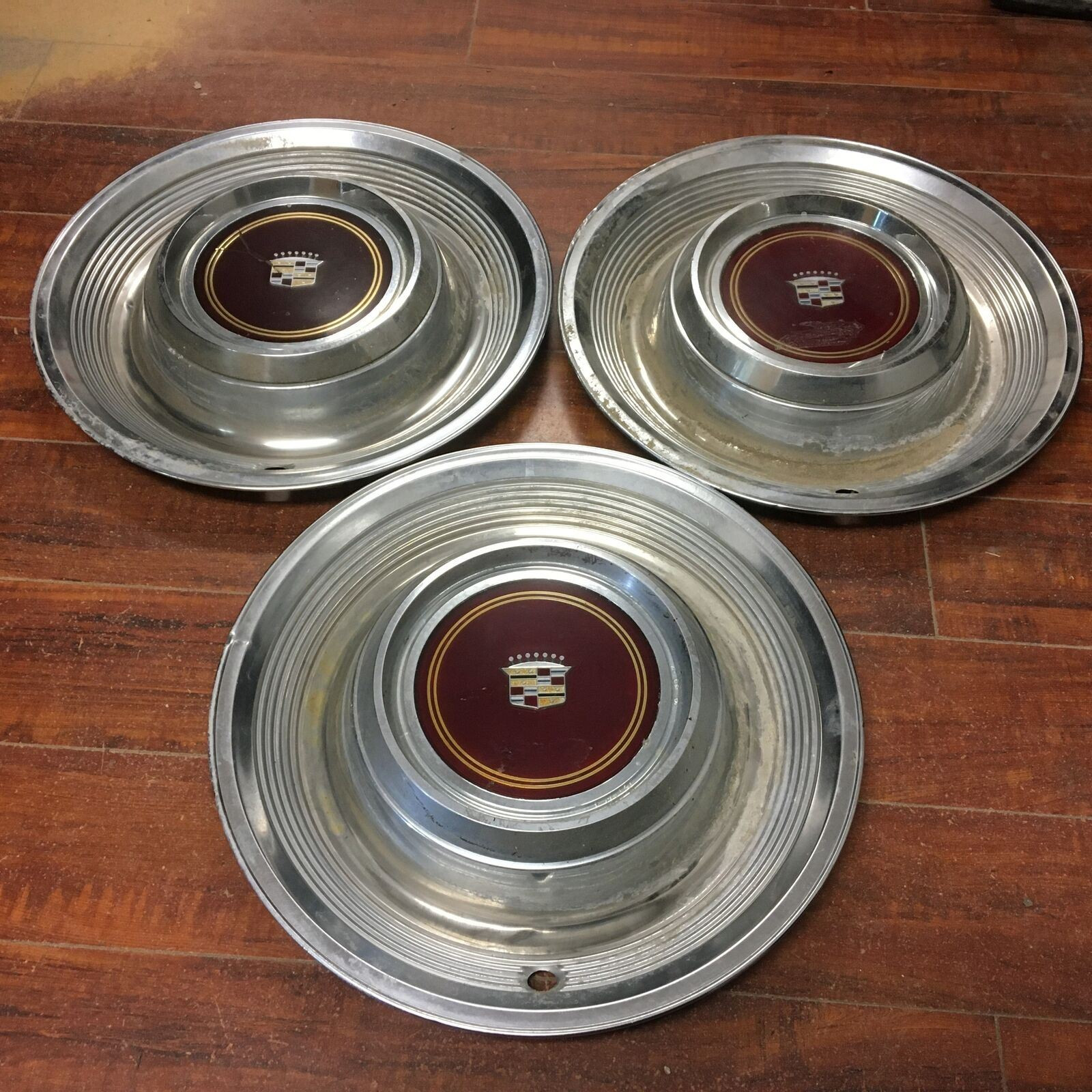 Three 19541955 Vintage CADILLAC HUB CAPS Taz Wheels