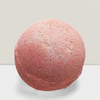 Boujee Bomb CBD bath bomb in pink with copper shimmer by Exotic Elephant