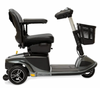 Side view of the Pride Mobility Revo 2.0 3-wheel mobility scooter with black seat and Grey Street body panels