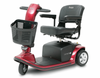 Pride Mobility Victory 9 3-wheel mobility scooter with black seat, front basket, and red body panels