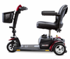 Side view of the Pride Mobility Go Go Sport 3-wheel mobility scooter with black seat and red body panels