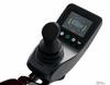 Close-up of the Pride Mobility Jazzy Carbon HD joystick controller with display screen and speed buttons