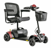 Pride Go Go Elite Traveller 2 4-Wheel mobility scooter in Red with black mesh captain’s seat and front basket