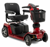 Pride Zero Turn 10 4-Wheel mobility scooter in Candy Apple Red with black captain’s seat and front basket
