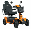Pride Pursuit 2 heavy duty mobility scooter in orange with black captain’s seat and dual mirrors