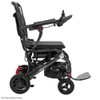 Side view of the Pride Mobility Jazzy Carbon folding power wheelchair with black seat and black frame