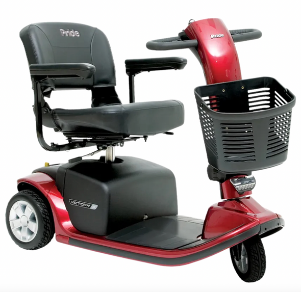 Pride Mobility Victory 9 3-wheel mobility scooter with black seat, front basket, and red body panels