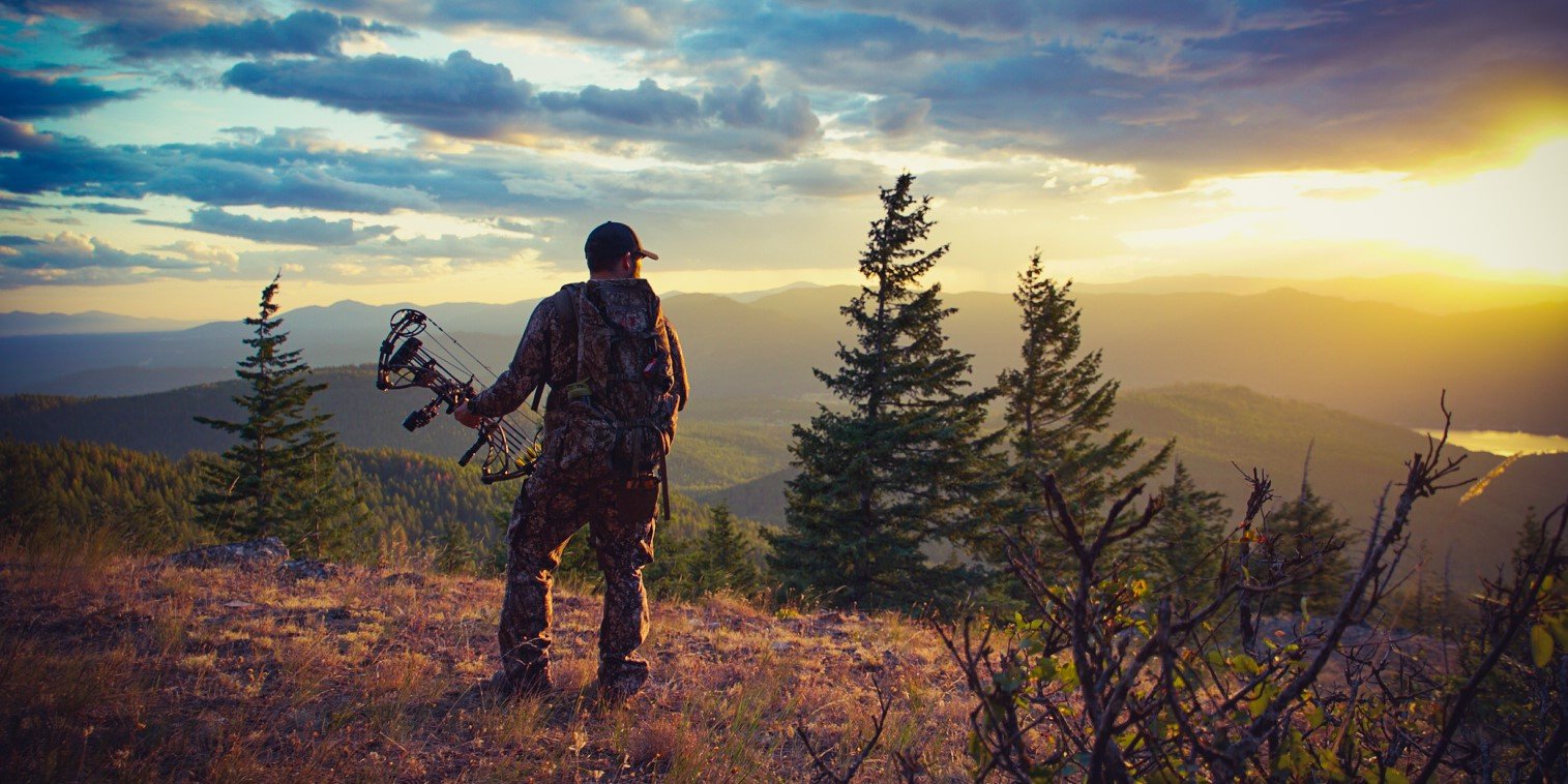 Bow hunter in woods