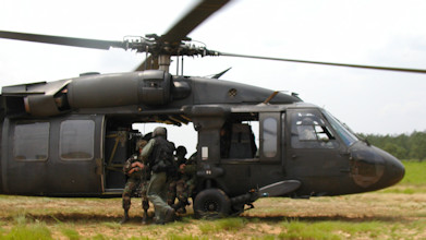 Military helicopter with soldiers