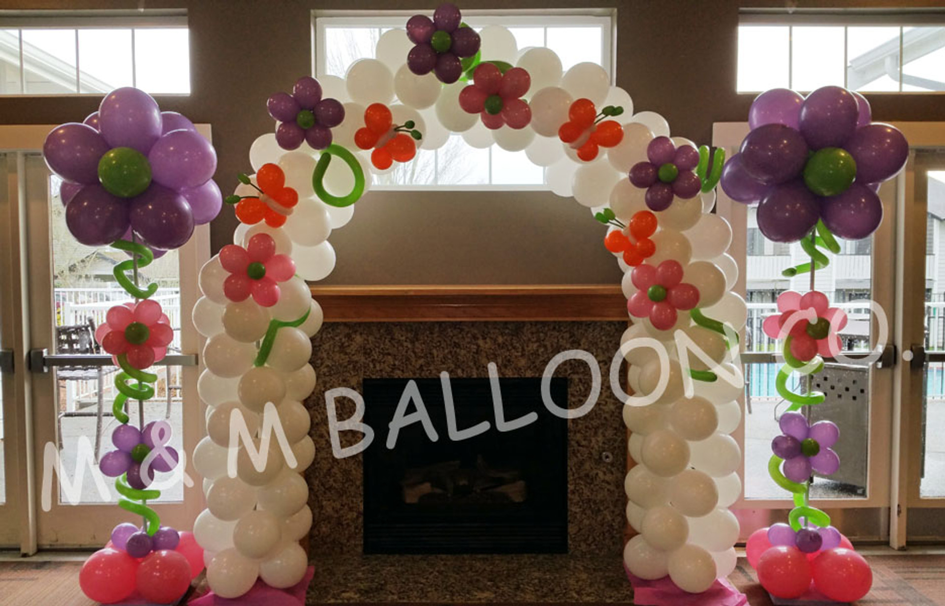 Arch with Flower Pole Columns - M & M Balloon Co. of Seattle