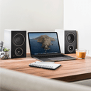 Home display of PSB AM3 Compact Powered Speakers