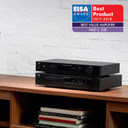 NAD C 338 Hybrid Digital Amplifier stack on shelf showing EISA Best Product 2017-2018 Award
