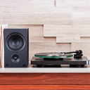 Home display of PSB Alpha AM5 Powered Bookshelf Speakers