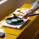 Lifestyle of the Pro-Ject T2 Super Phono Turntable with dustcover in Gloss White with the Sumiko Rainier Cartridge