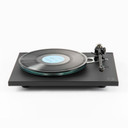 Higher angle front view Rega Planar 6 Turntable in Polaris Gray with the Nd7 Cartridge with record