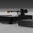 Lifestyle image of Satin Black Pro-Ject X2 B Turntable with Ortofon Quintet Red