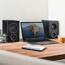 Home display of PSB AM3 Compact Powered Speakers