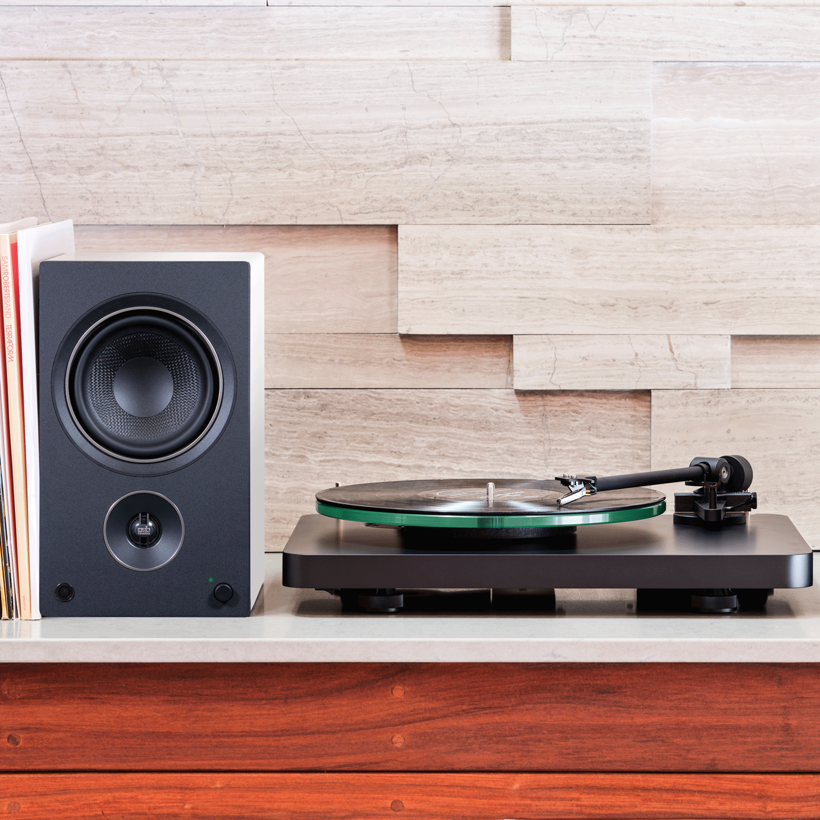 Home display of PSB Alpha AM5 Powered Bookshelf Speakers