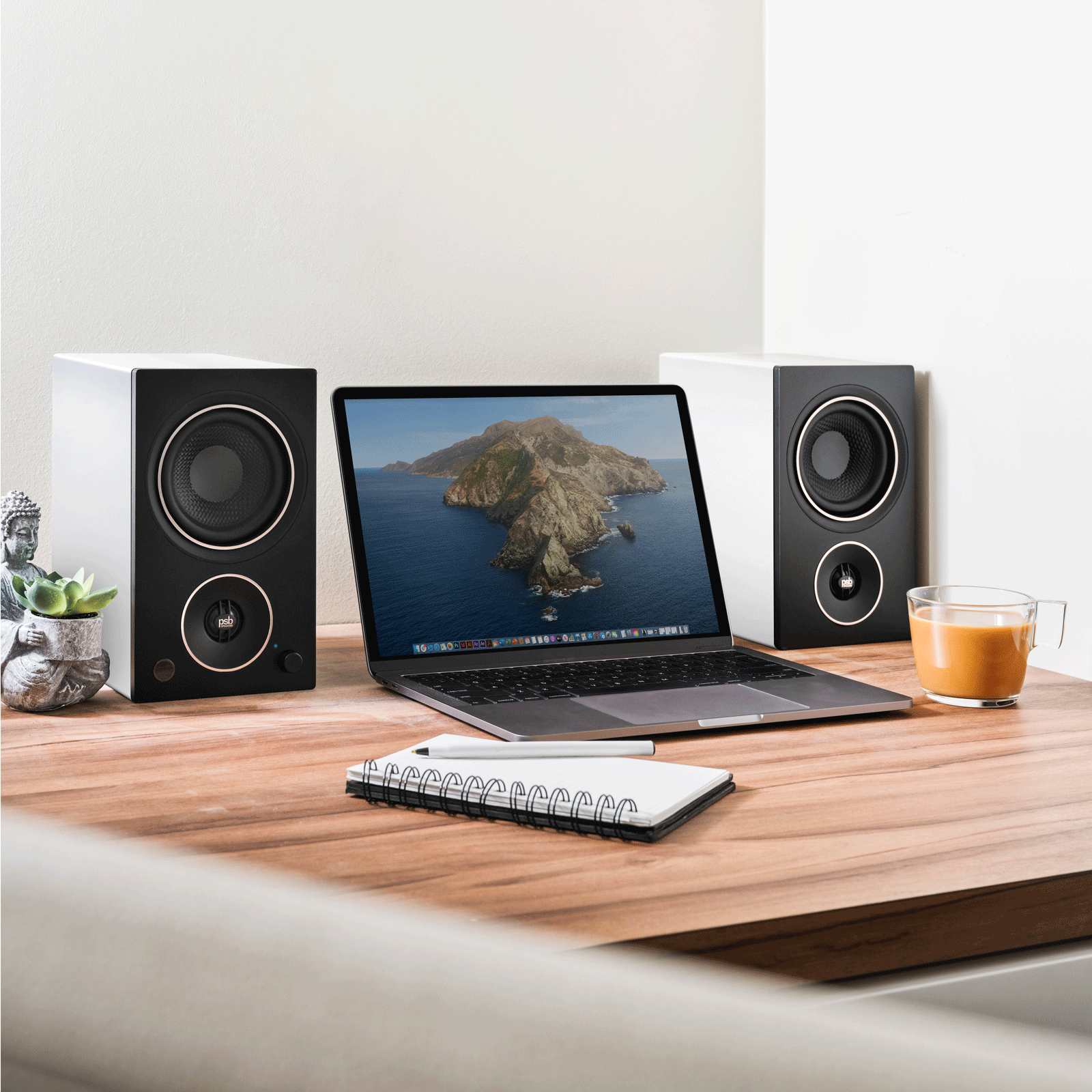 Home display of PSB AM3 Compact Powered Speakers