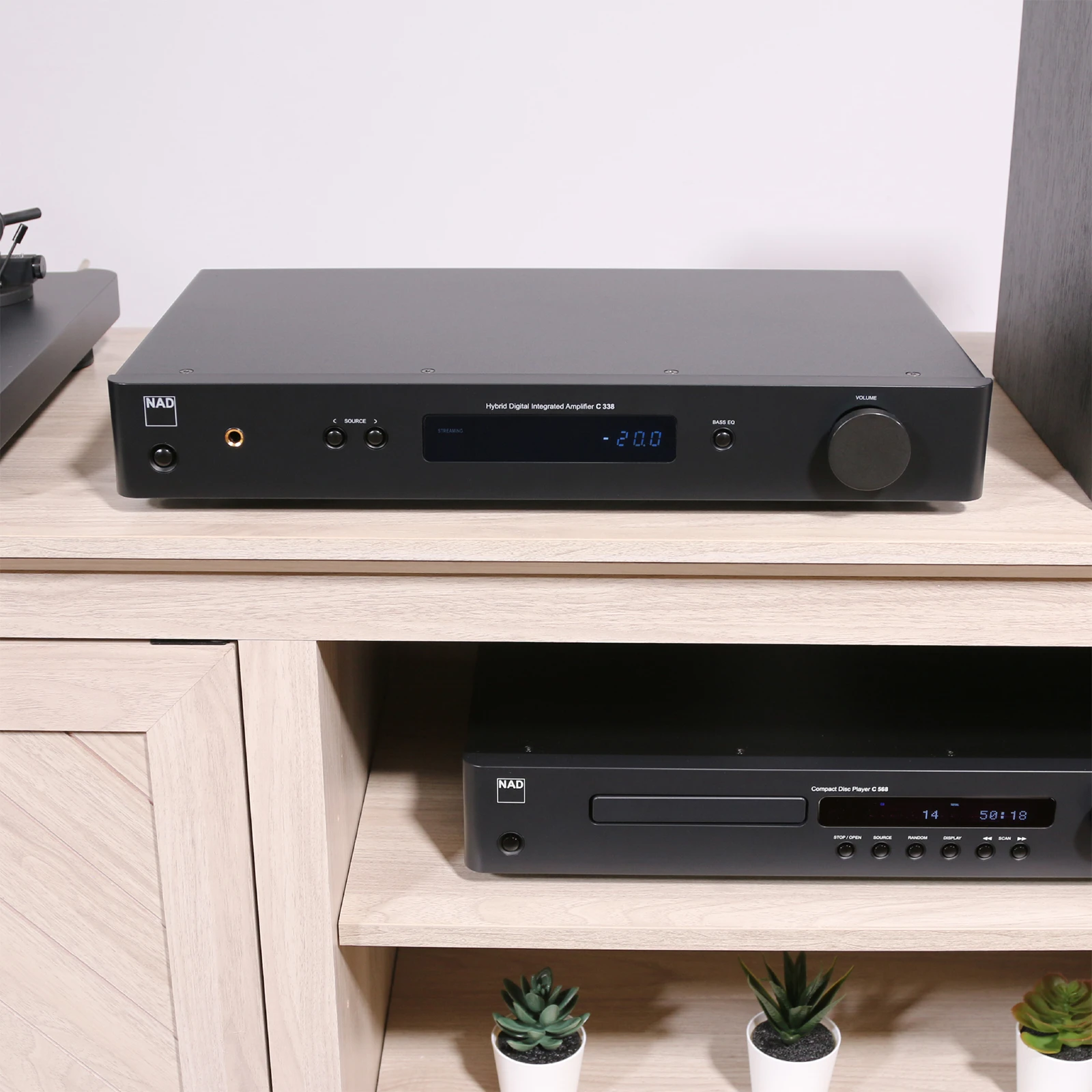 NAD C 338 Hybrid Digital Amplifier on shelf 