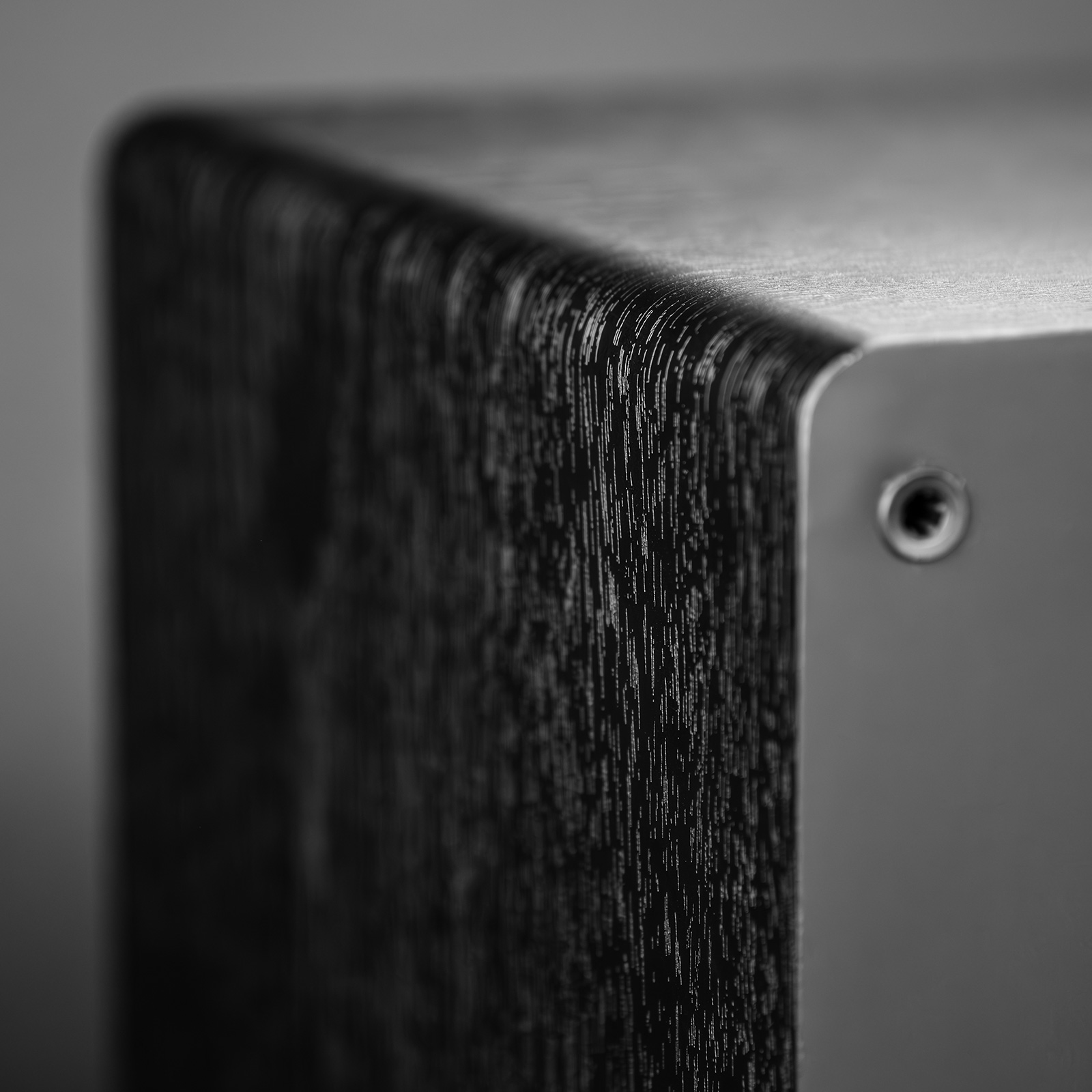 detail view of black ELAC ConneX DCB61 Powered Speakers