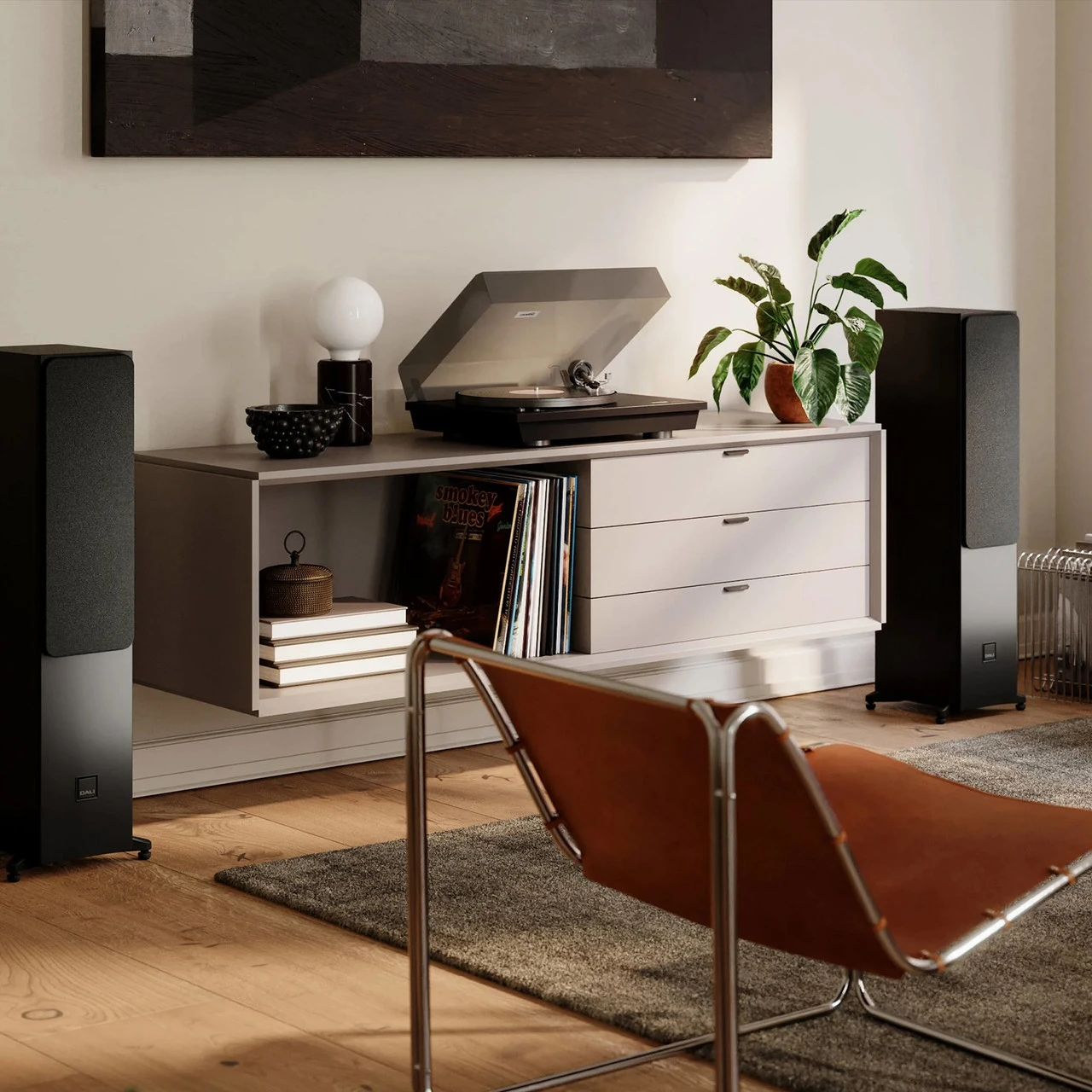 Black Ash DALI SONIK 5 Tower Loudspeaker in living room.
